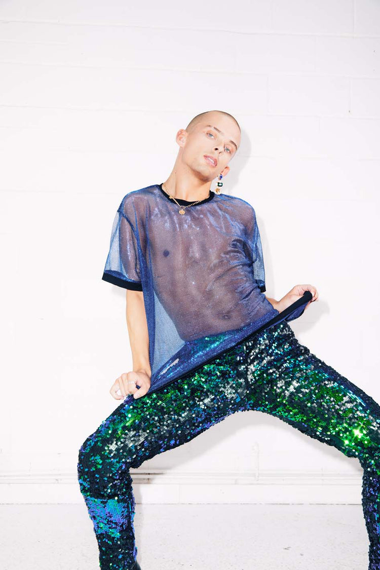 Man wearing blue mesh t-shirt